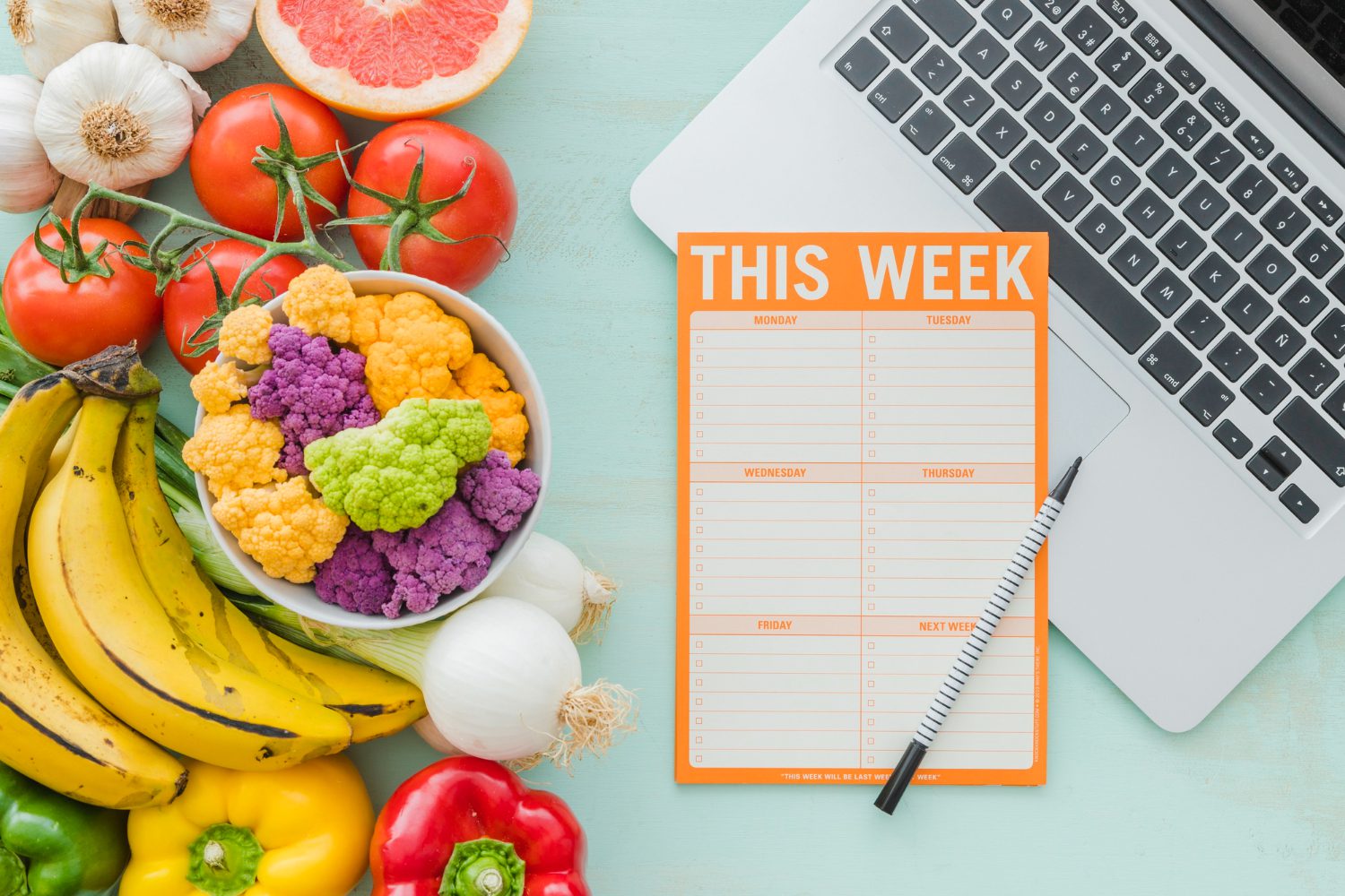 Diet week plan and healthy vegetables on background